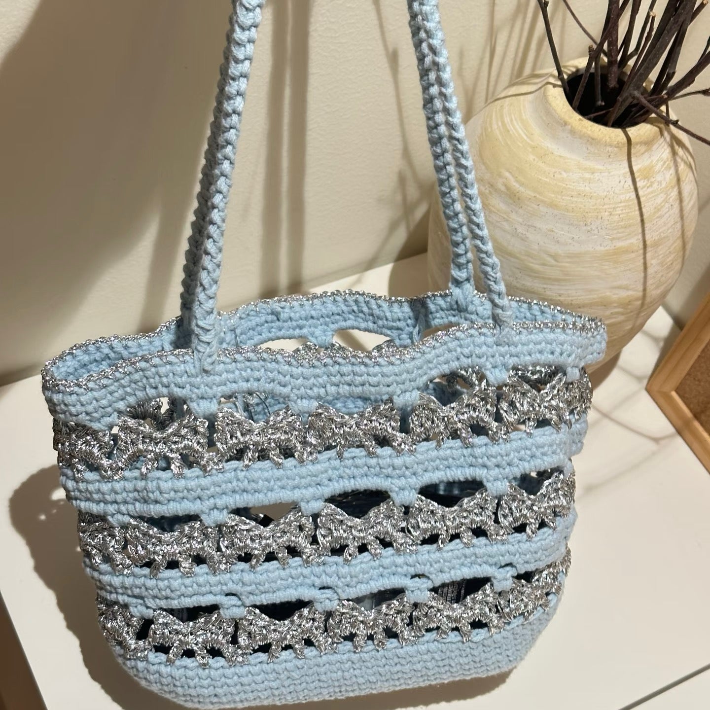 Silver butterfly blue wave bag